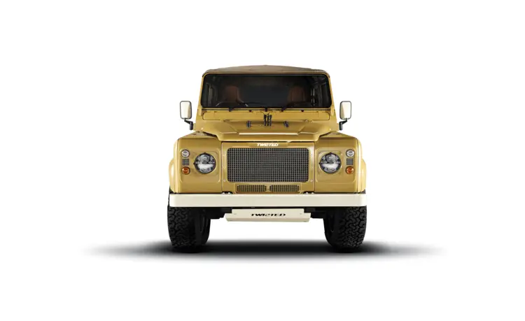 Front View of Yellow Classic Land Rover SUV