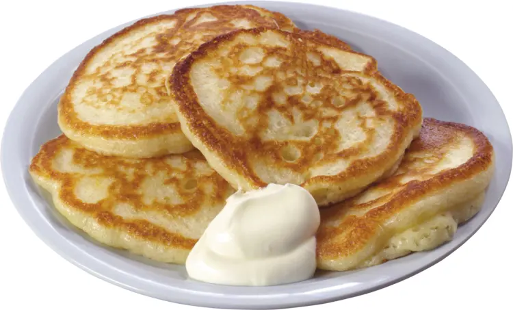 Pancakes with Cream on Plate