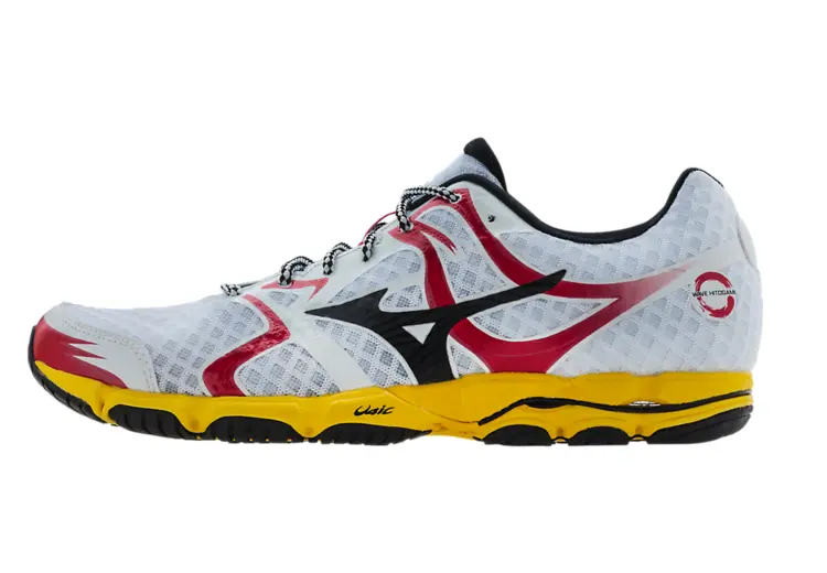 White and Yellow Running Shoe with Red Accents