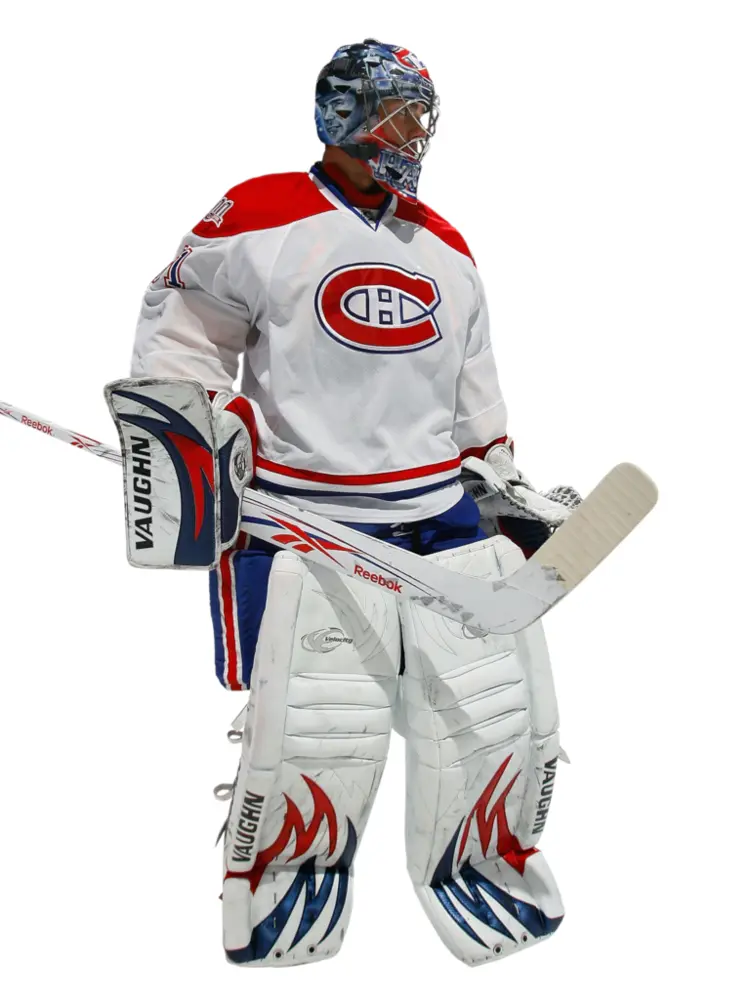 Hockey Goalie in White and Red Uniform