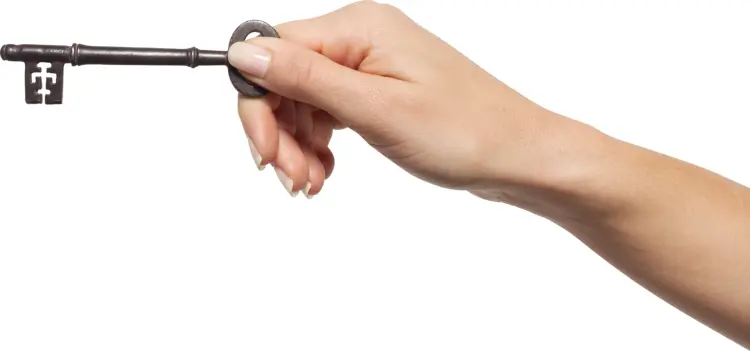 Hand Holding a Key