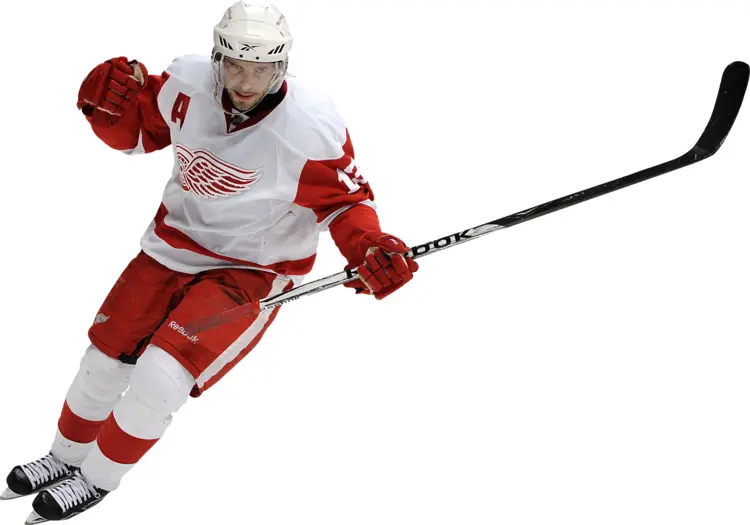 White and Red Hockey Player in Action