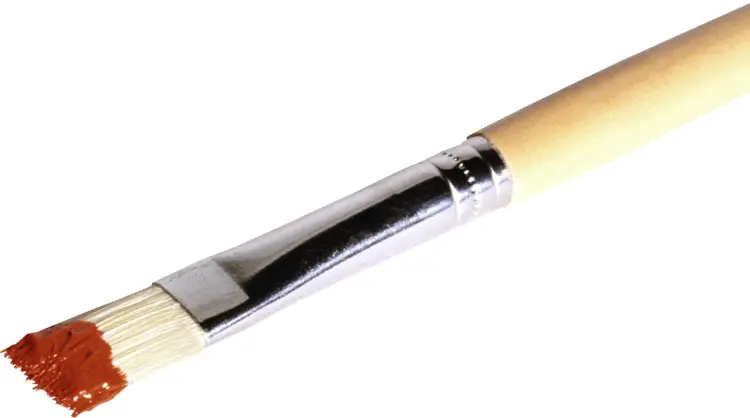 Paint Brush with Red Paint on Bristles