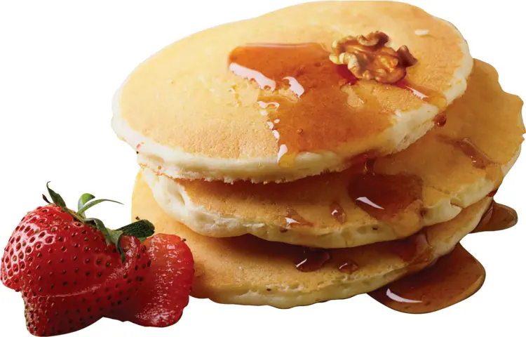 Delicious Pancakes with Syrup and Strawberries