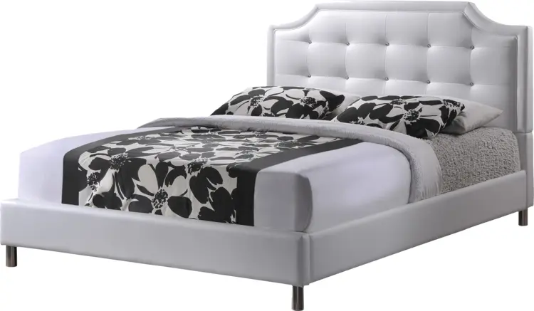 White Bed with Floral Bedding