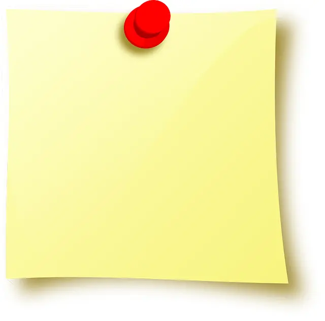 Yellow Sticky Note with Red Pin
