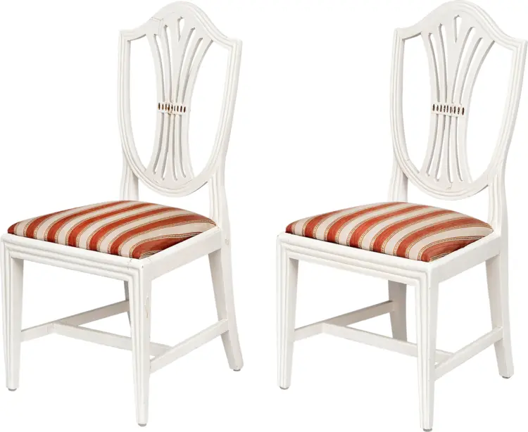 Elegant White Chairs with Striped Cushions