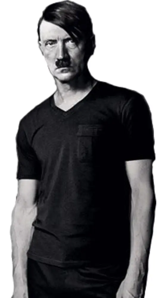 Man in Black T-Shirt with Serious Expression