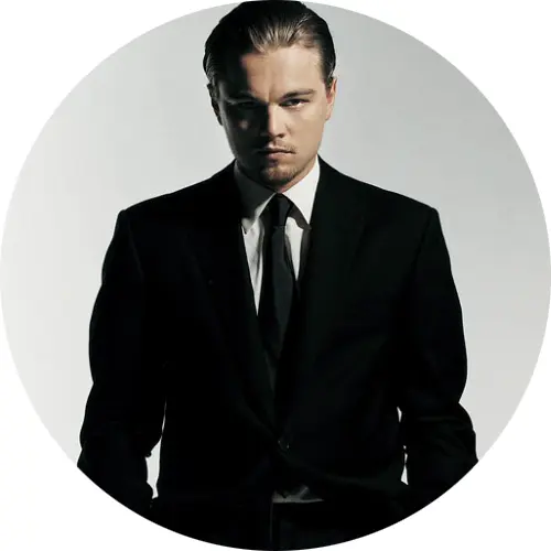 Man in Black Suit with Serious Expression