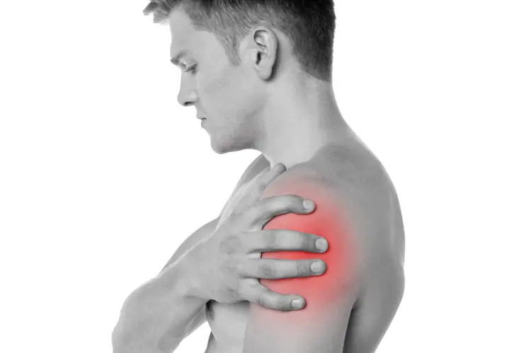 Man Holding Shoulder in Pain