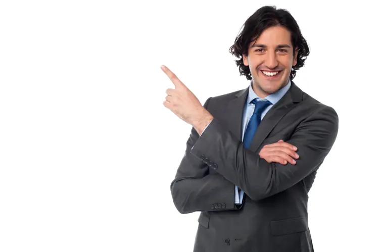 Smiling Man in Suit Pointing
