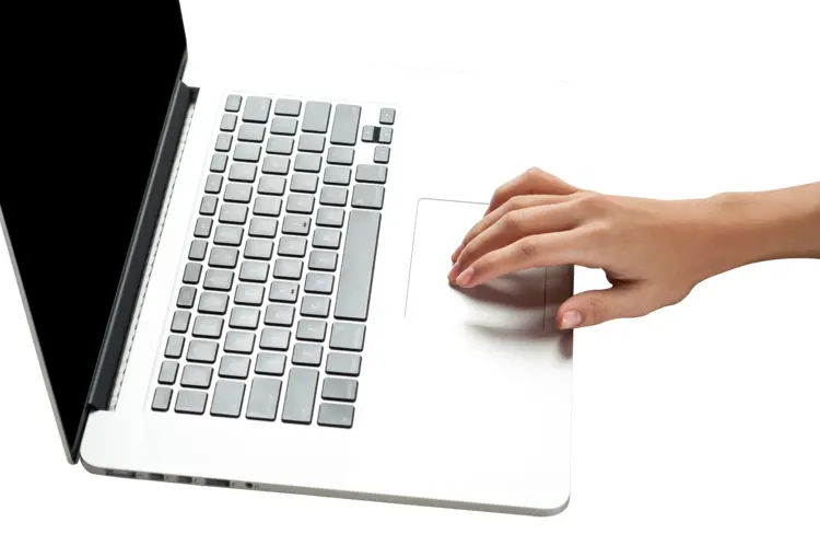 Hand on Laptop Touchpad