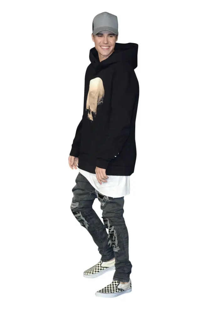 Person in Casual Outfit with Black Hoodie and Ripped Jeans