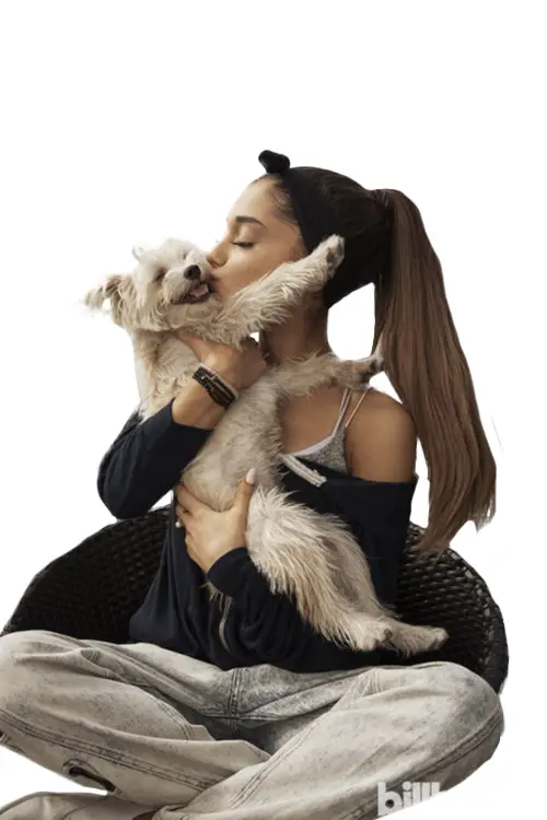Woman Kissing Dog