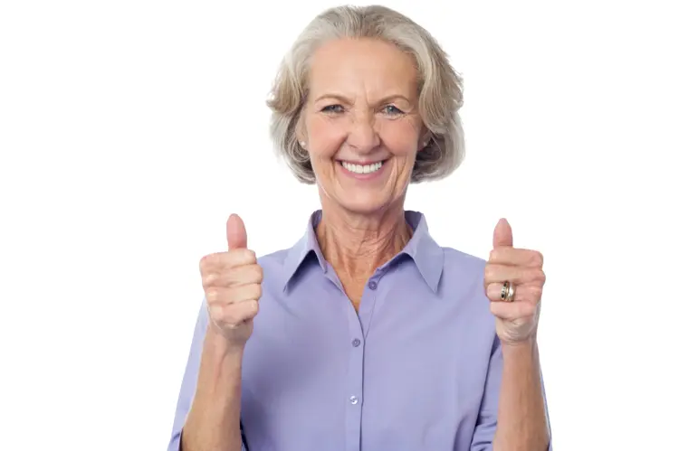 Smiling Elderly Woman Giving Thumbs Up