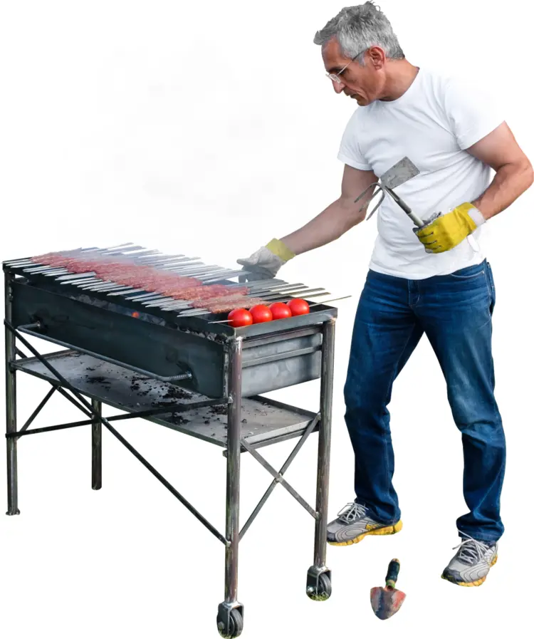 Man Grilling Food Outdoors