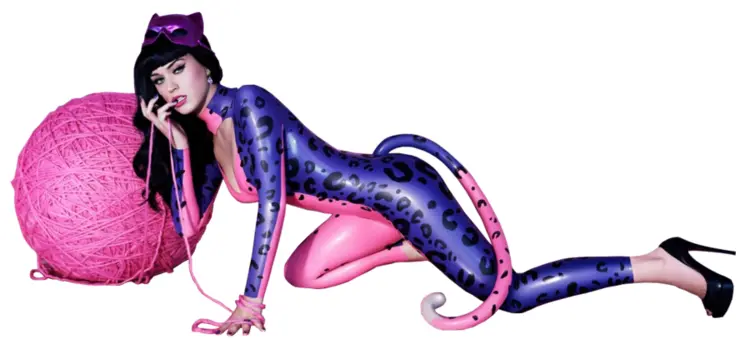 Woman in Purple and Pink Cat Costume with Yarn Ball