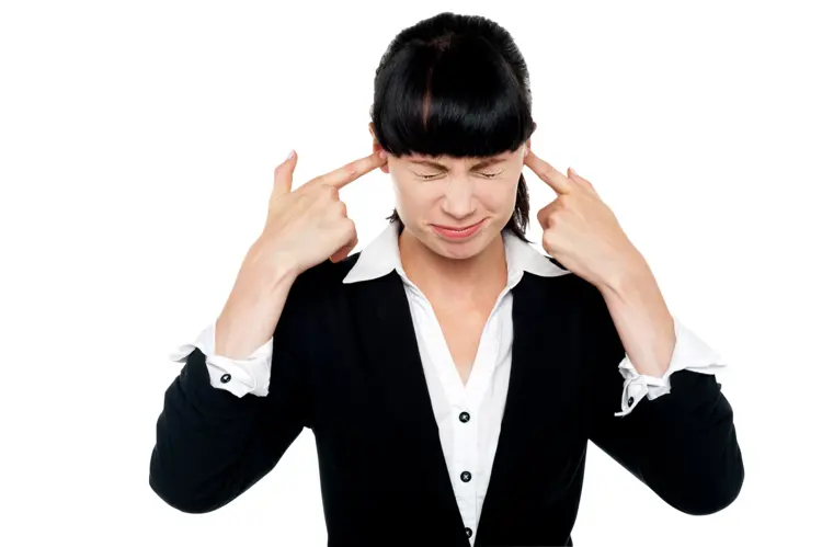 Frustrated Woman Covering Ears