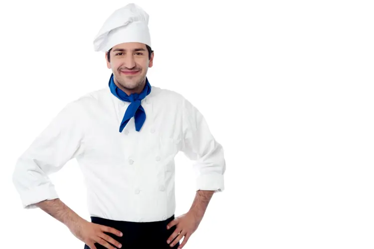 Smiling Chef in White Uniform