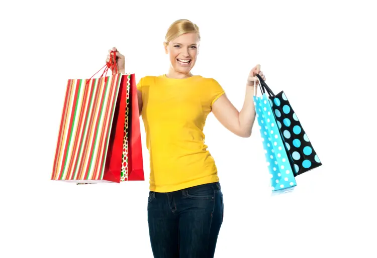 Woman in Yellow Shirt Holding Shopping Bags