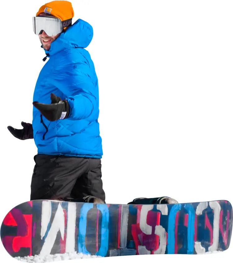 Snowboarder in Blue Jacket Enjoying Winter Sports