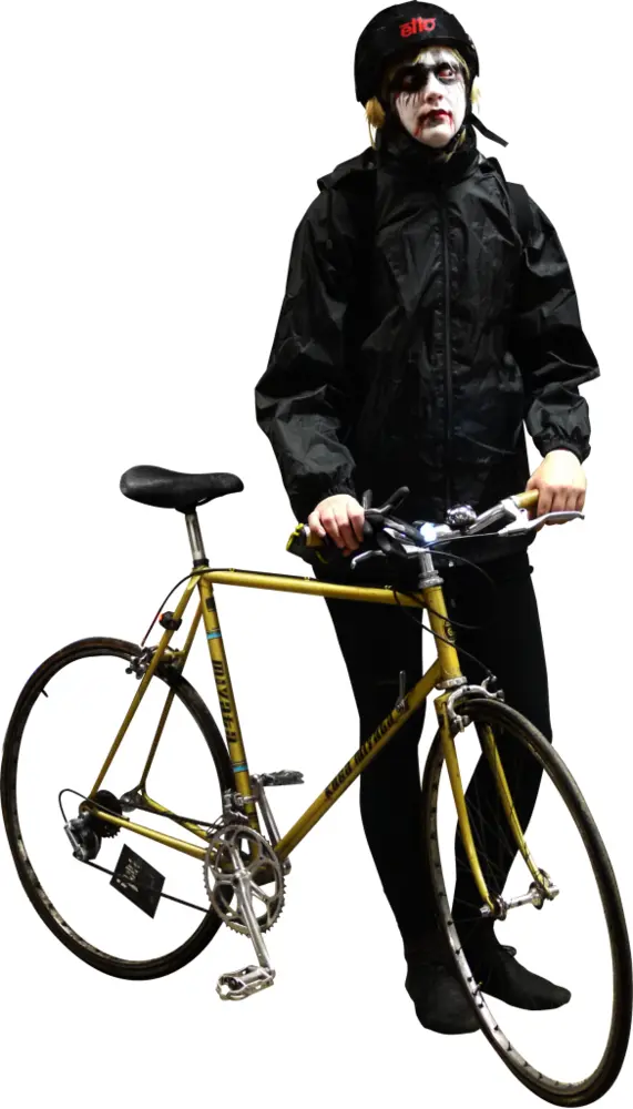 Person Standing with Bicycle