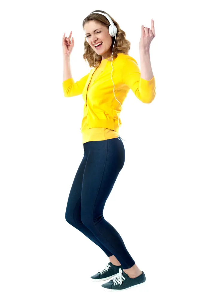 Dancing Woman in Yellow Outfit with Headphones
