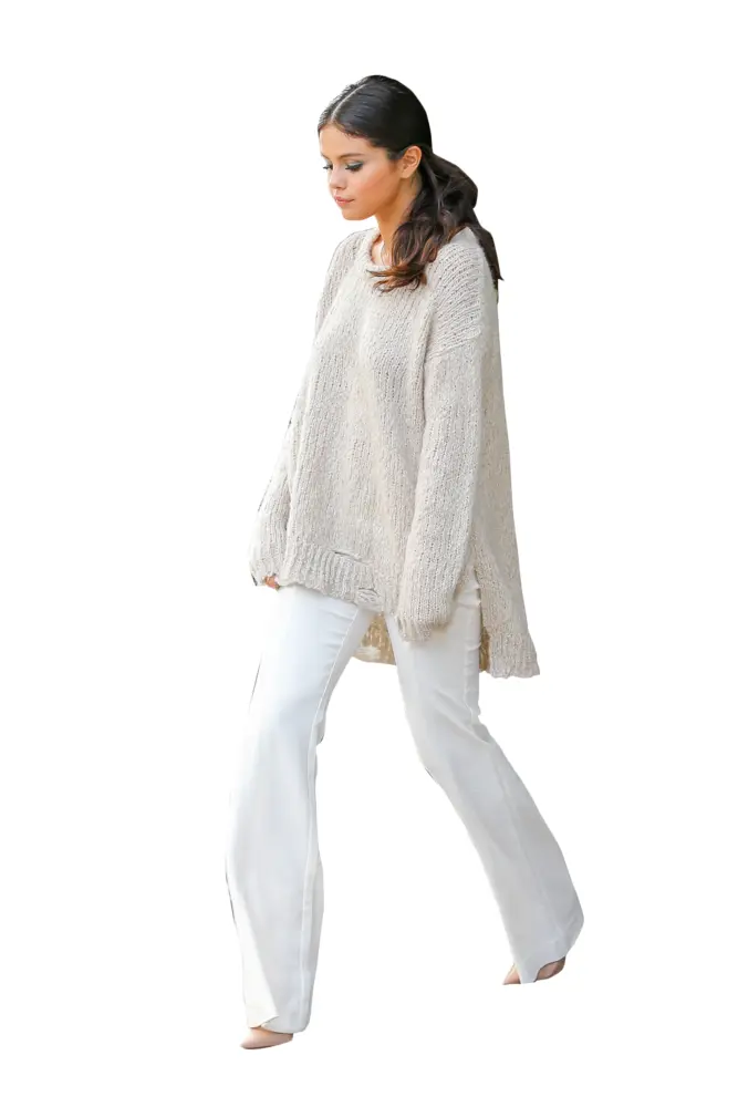 Woman in Beige Sweater and White Pants
