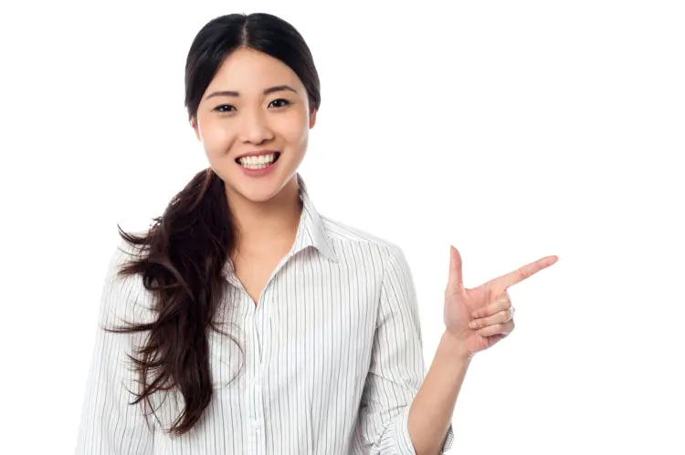 Smiling Woman Pointing to the Side