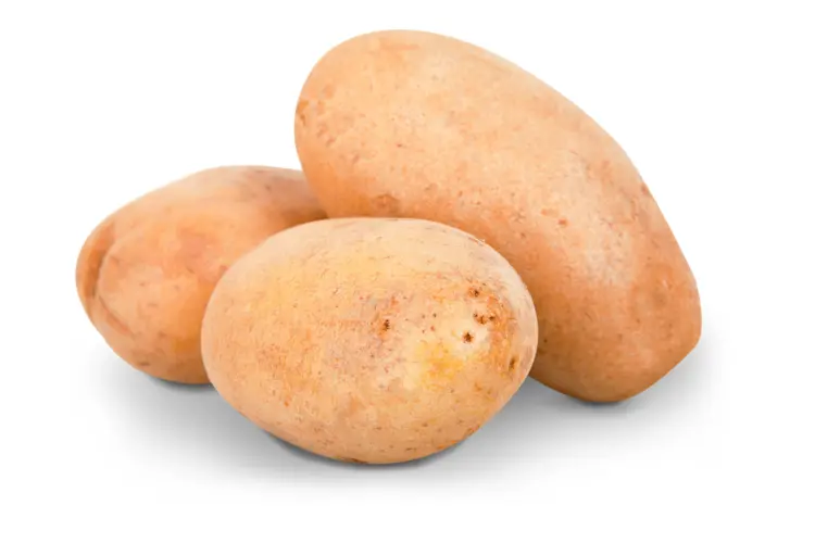 Three Fresh Potatoes