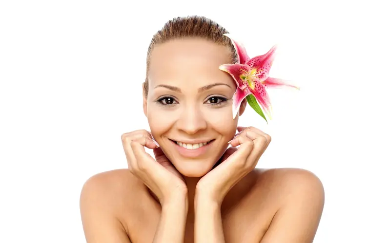 Smiling Woman with Flower in Hair