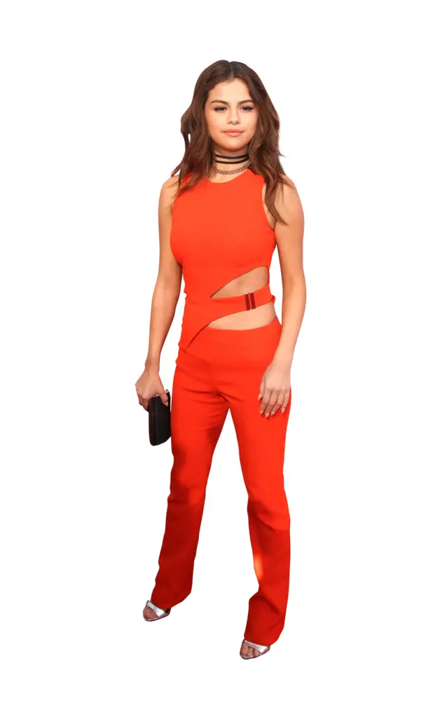 Elegant Woman in Red Jumpsuit with Clutch