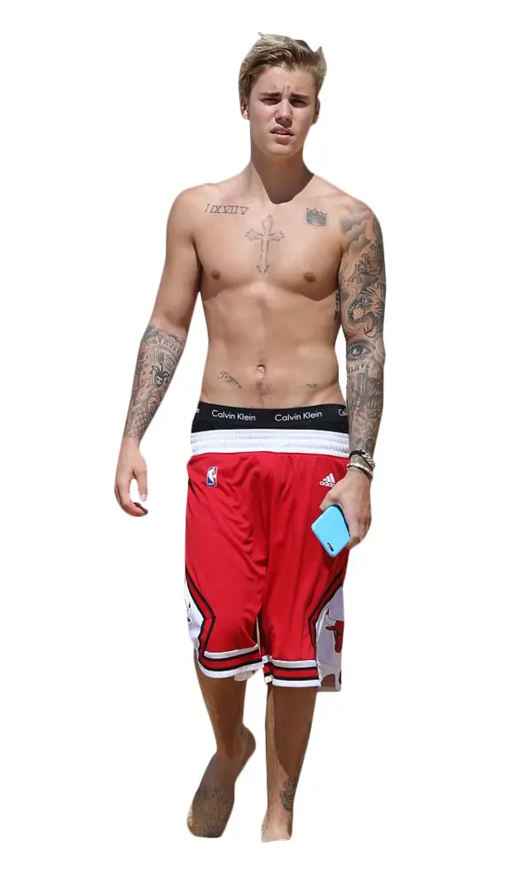 Man in Red Shorts with Tattoos
