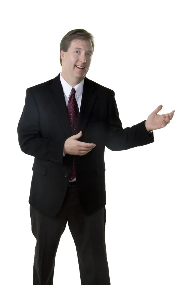 Businessman Presenting in Formal Suit
