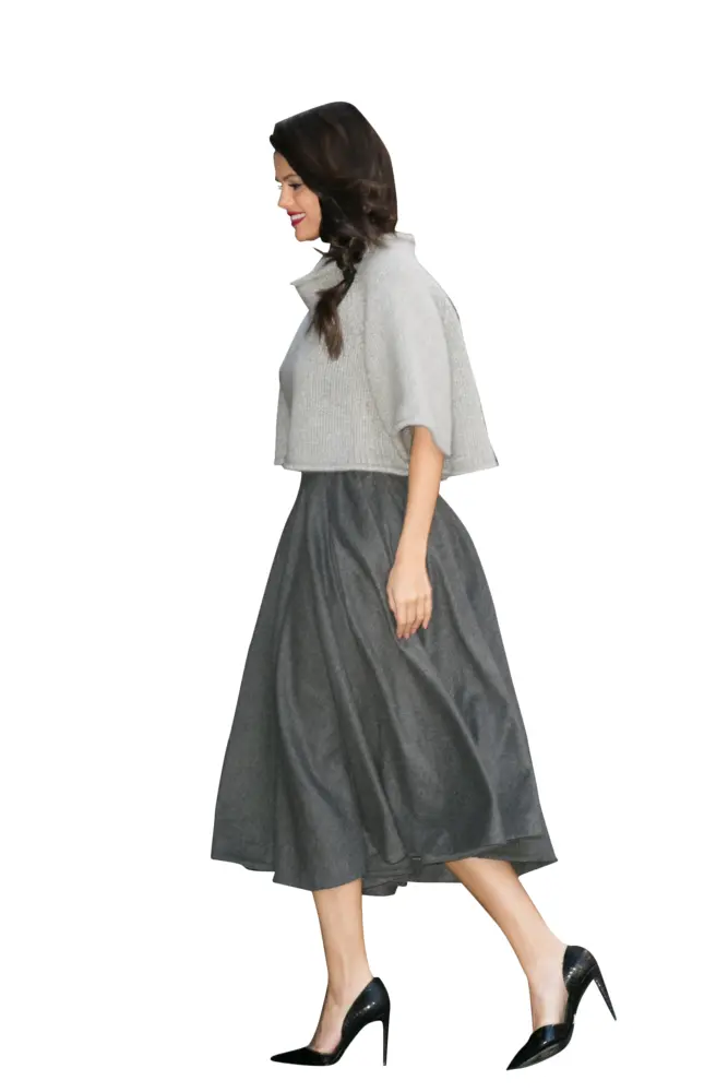 Elegant Woman in Grey Outfit