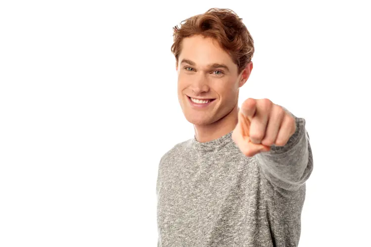 Man in Grey Shirt Pointing