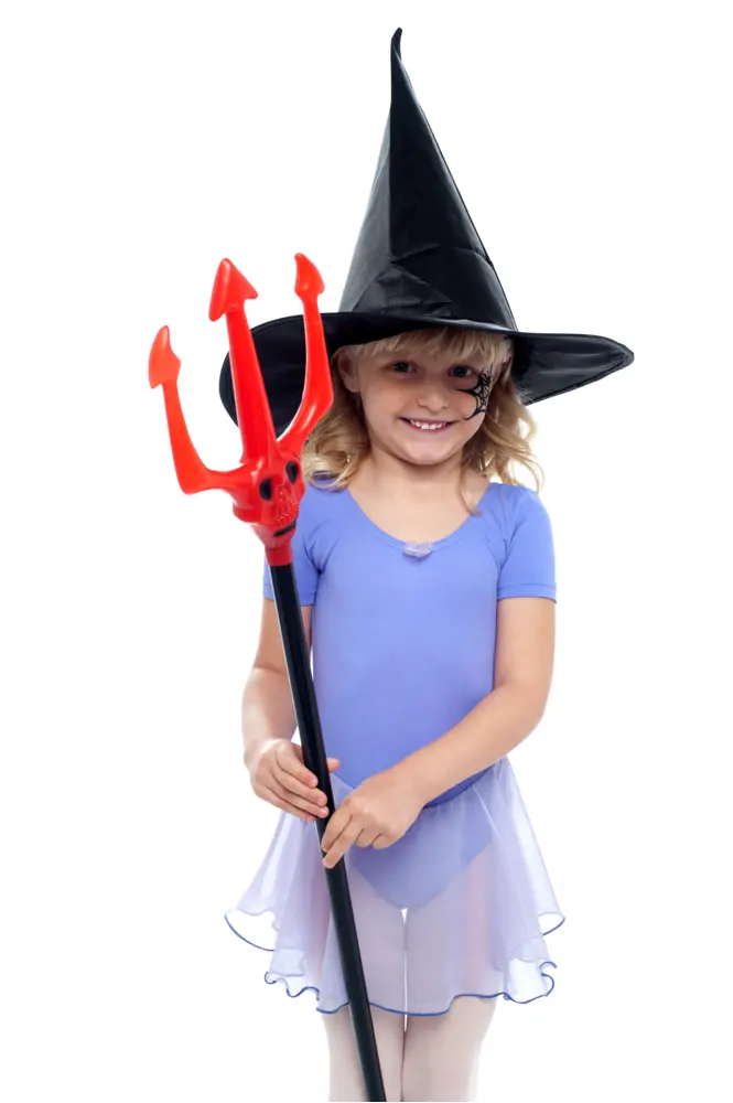 Smiling Girl in Witch Costume Holding a Trident