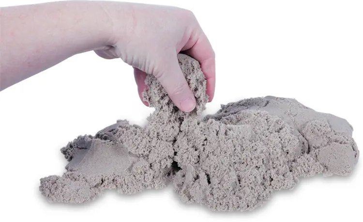Hand Holding Kinetic Sand