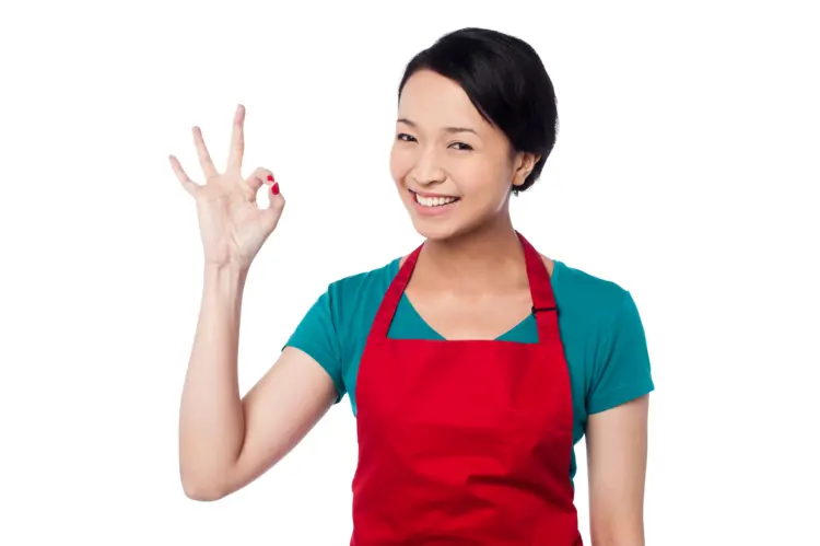 Smiling Woman Giving OK Sign