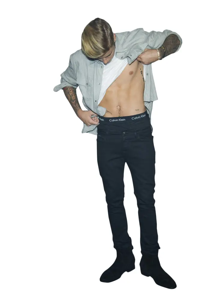 Young Male Showing Abs in Casual Outfit