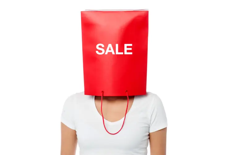 Woman with Sale Shopping Bag on Head