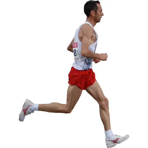 Running Athlete in Red Shorts