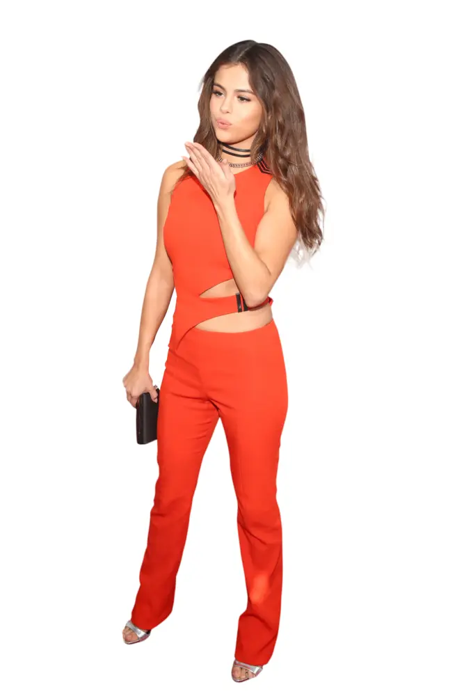 Elegant Woman in Red Jumpsuit with Clutch