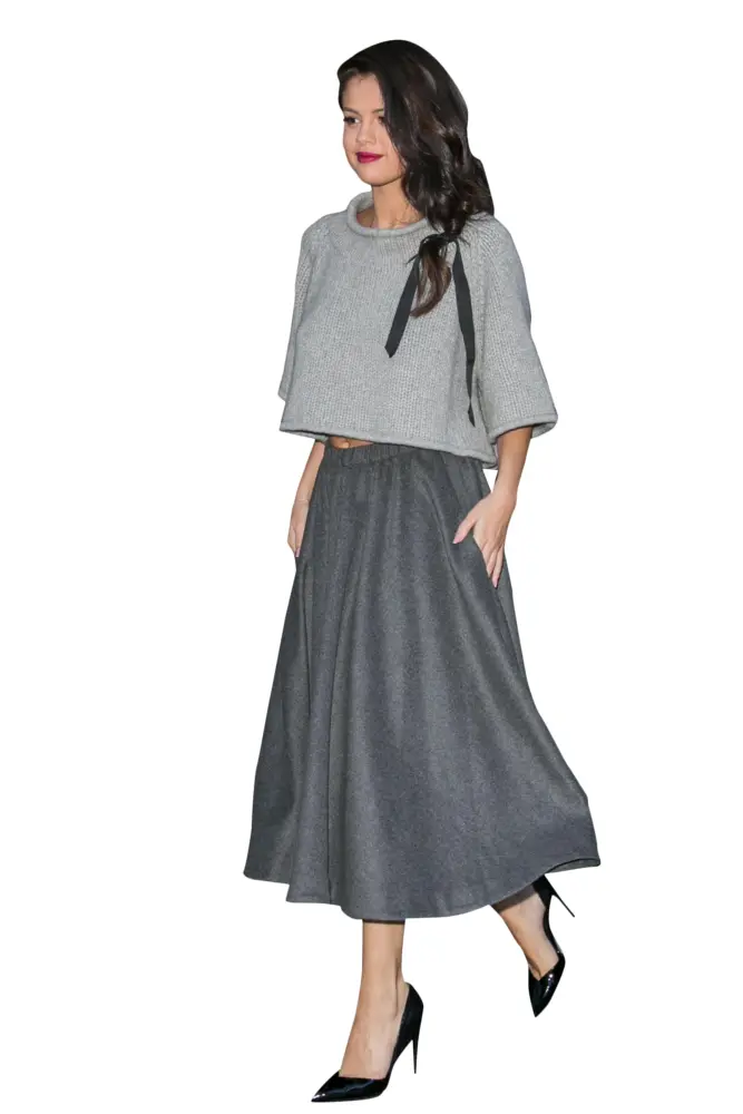Elegant Woman in Grey Outfit