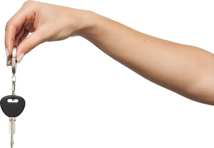 Hand Holding Car Key