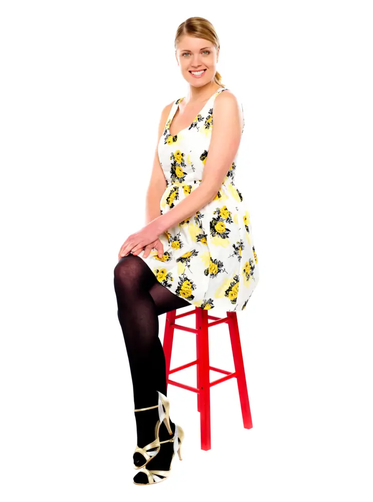 Woman Sitting on Red Stool