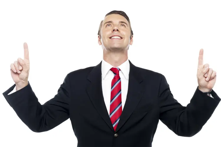 Smiling Man in Suit Pointing Up