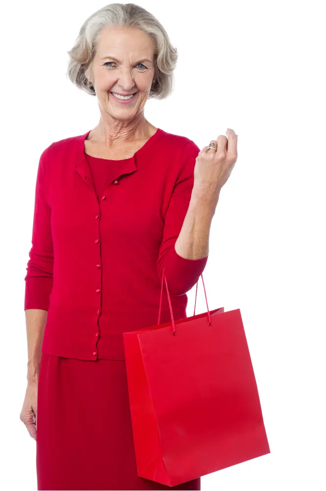 Happy Elderly Woman Holding Red Shopping Bag