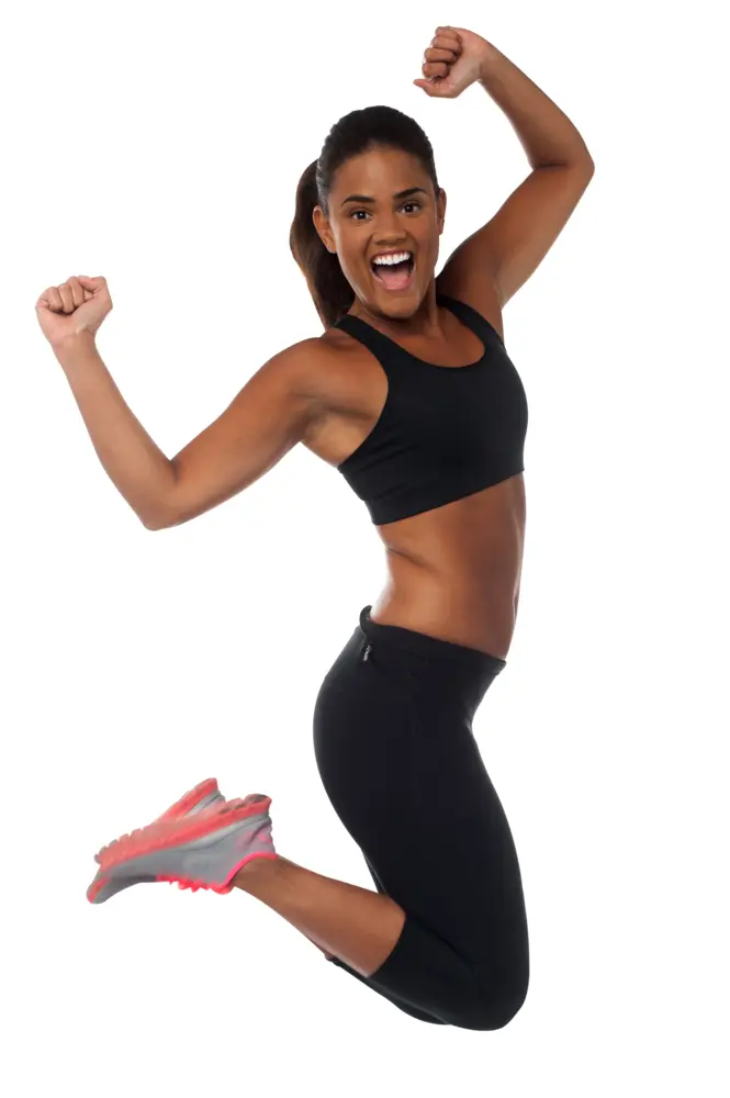 Energetic Woman Jumping in Black Sportswear