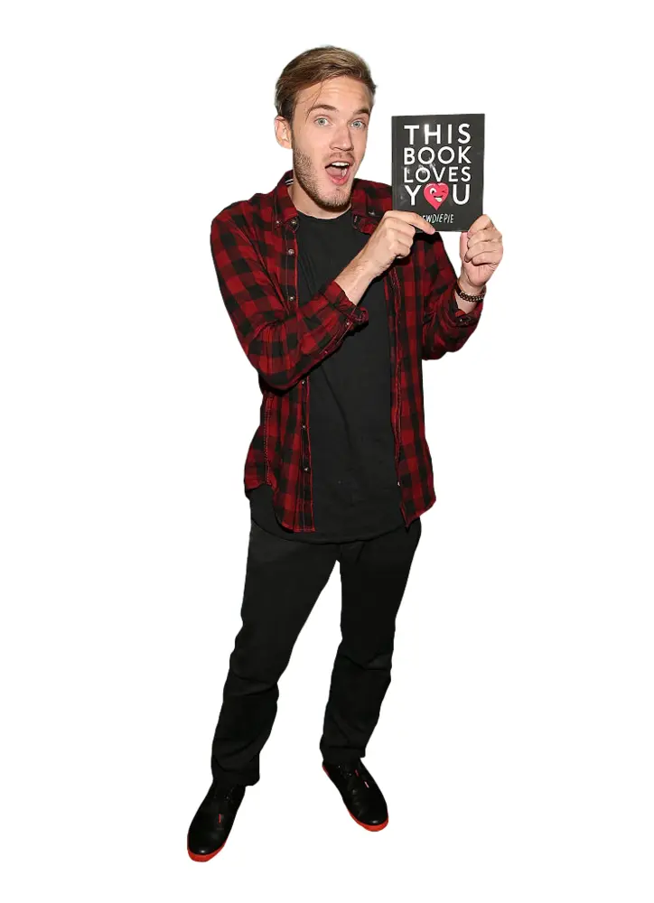 Man Holding Book in Red Plaid Shirt